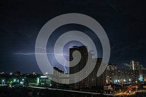 Lightning over the city at night