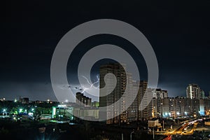 Lightning over the city at night