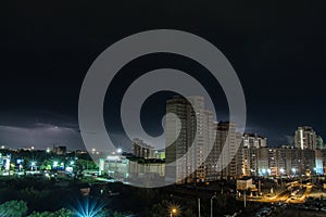 Lightning over the city at night