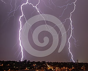 Lightning over city skyline