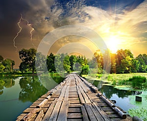 Lightning over the wooden bridge