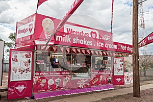 Wendys street vendor stall selling cold drinks, milkshakes and smoothies at a parade