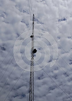 Lightning rod against a cloudy sky background