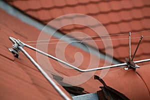 Lightning rod on a tiled roof