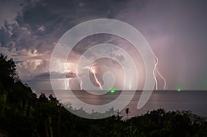 Lightning in the sea during the night storm