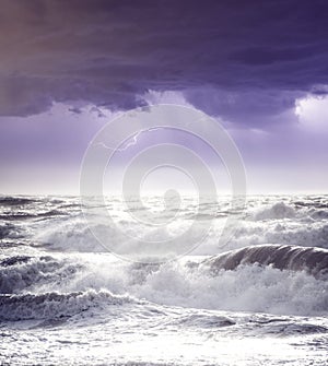 Lightning storm and crashing waves on the Cornish coast