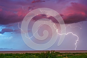 Lightning storm with dramatic sky at sunset