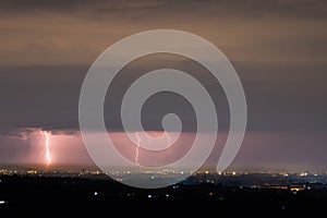 Lightning storm over city