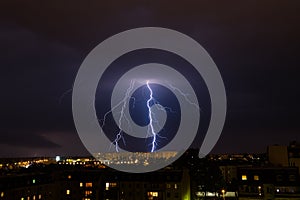 Lightning storm over city.