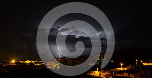 Lightning during a storm over the city of iglesias, south sardinia