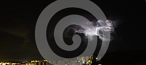 Lightning during a storm over the city of iglesias, south sardinia