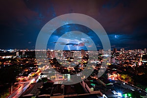 Lightning Storm Over Ribeirao Preto City in Brazil. Thunder blue light on a summer night concept image