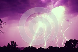 Clouds and thunder lightnings and storm on dark cloudy sky