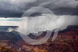 Lightning strikes as a strong thunderstorm moves through the Grand Canyon