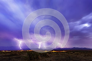 Multiple lightning Strikes in dark blue sky