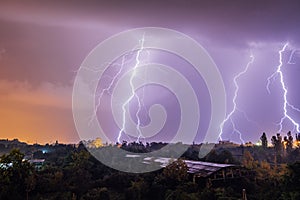 Lightning strikes during thunderstorm over the city