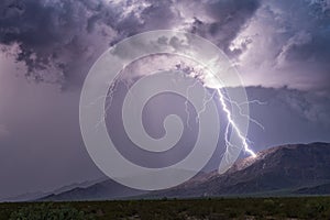 Lightning striking a mountain