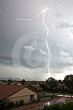 Lightning and thunderstorm flash with raining background