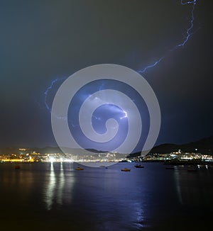 Lightning thunderstorm on stormy sky