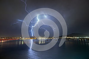 Lightning thunderstorm on stormy sky on Getxo