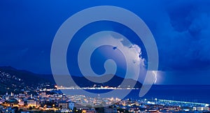 Lightning and thunderstorm on the Tigullio Gulf - Ligurian sea - Chiavari - Italy photo