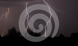 Lightnings and night thunderstorm photo