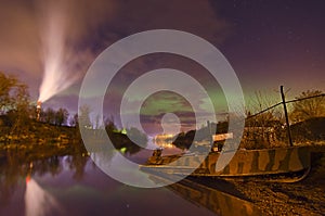 Lights above the lake,man with a dog-Aurora borealis