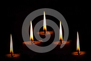 Lights of candles in a dark symbol of hope