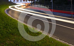 Lights of the cars on the road to the tunnel.