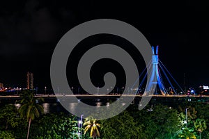 Lights of Encanta Moca, Enchanted lady Bridge and Capibaribe river night view from Shopping Rio Mar, Recife, Pernambuco, Brazil photo