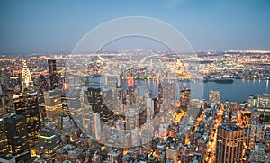 Lights of Manhattan at night, aerial view of New York City