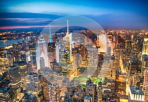 Lights of Manhattan at night, aerial view of New York City