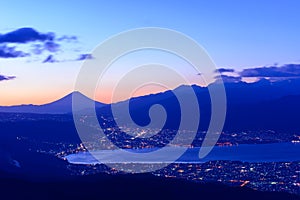 Lights of Suwa city and Mt.Fuji at dawn