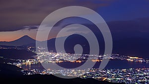 Lights of Suwa city and Mt.Fuji at dawn photo
