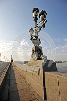 The lights on the Troitsky bridge over the Neva river