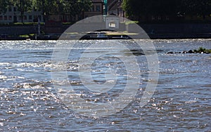 Lights on water flow on river Glomma in Water in Fredrikstad Norway in summer