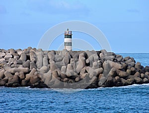 Lighttower and harbor entrance in Nazare, Centro - Portugal