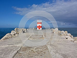 Lighttower and harbor entrance in Nazare, Centro - Portugal