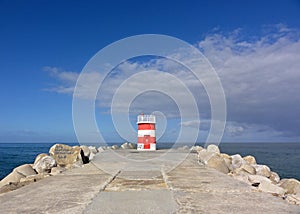 Lighttower and harbor entrance in Nazare, Centro - Portugal