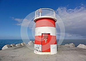 Lighttower and harbor entrance in Nazare, Centro - Portugal