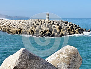 Lighttower and harbor entrance in Nazare, Centro - Portugal