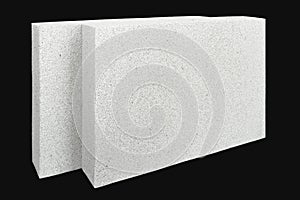 Lightweight foamed gypsum block isolated on black