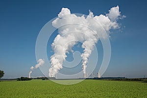 Lignite power plant for electricity generation - steam rises fro