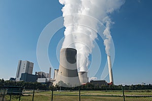 Lignite power plant for electricity generation - steam rises fro