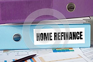 A lignt blue folder with the label HOME REFINANCE