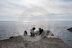 Liguria Genova two person are relaxing with chess game