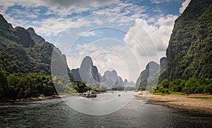 Lijiang or Li river, boats and mountains in Guilin, China