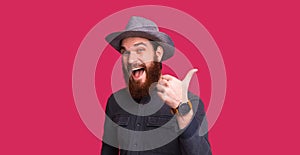 LIKE IT !!! Bearded man with hat, looking excitment at camera an photo