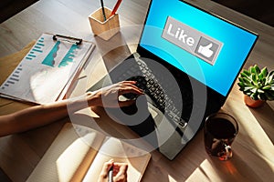 Like button on screen. SMM, Social media marketing concept.