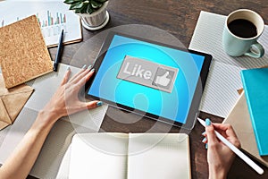 Like button on screen. SMM, Social media marketing concept photo